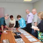 John Boos Chamber members reviewing historical documents