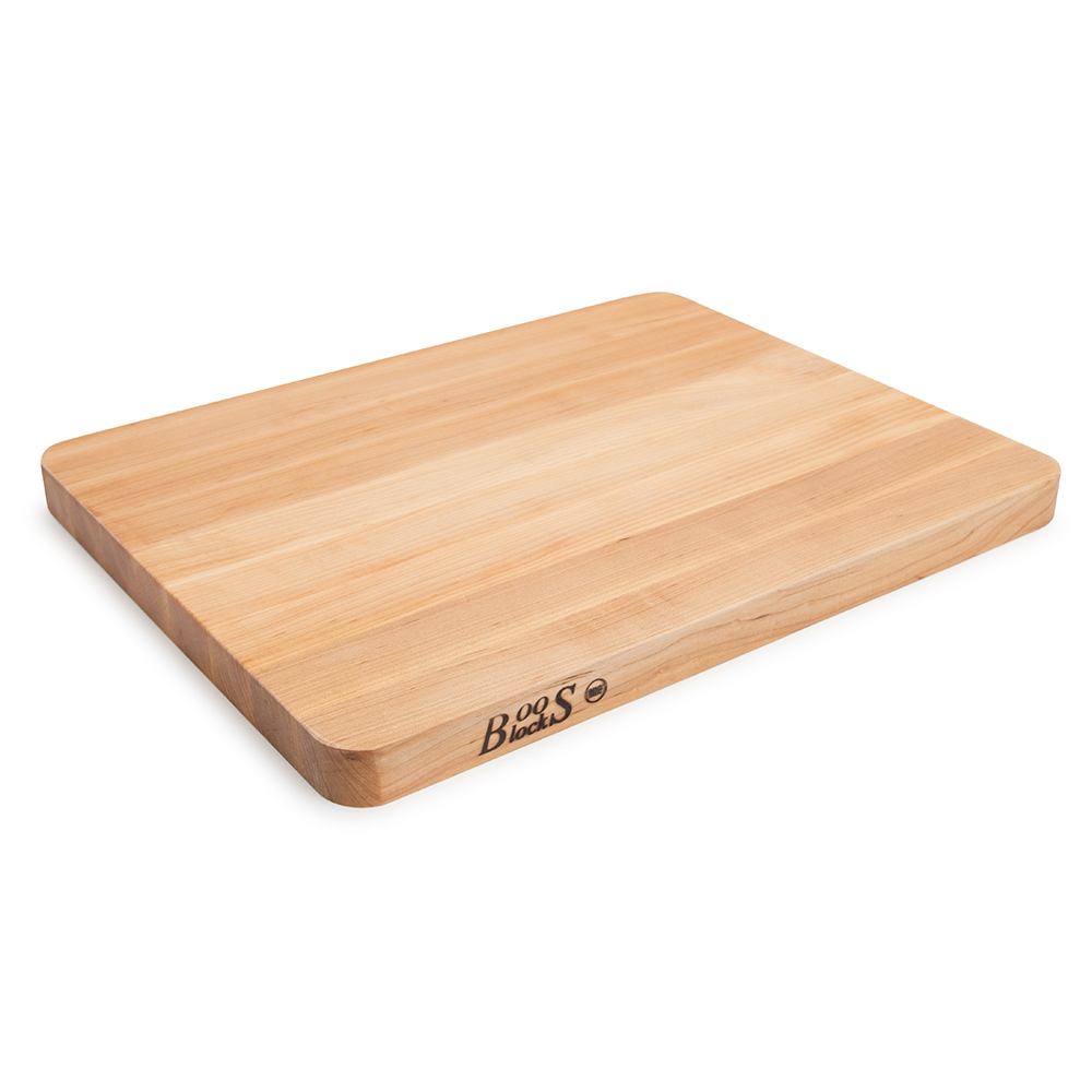 This is a hand crafted, solid Rock Maple corner cutting board