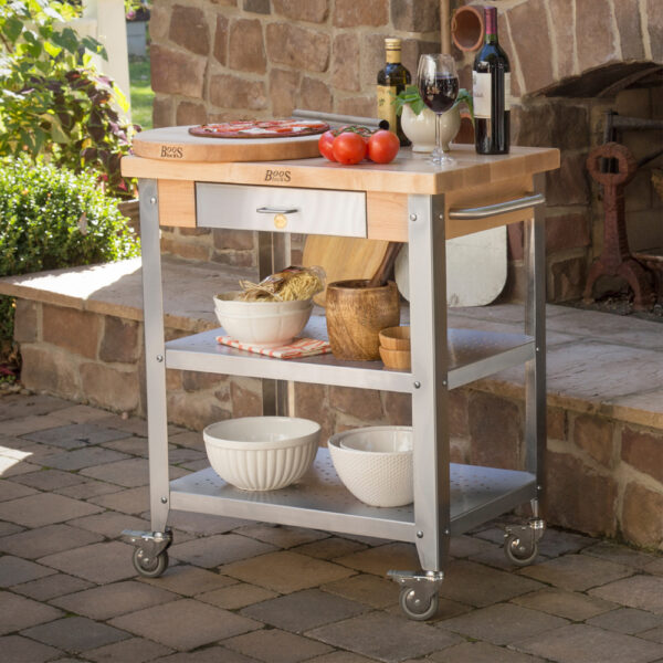 Maple Cucina Elegante Kitchen Cart (No Drop Leaf) holding wine and pizza on outdoor patio